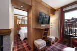 Experience the charm of this cozy mountain retreat, featuring rustic wooden accents and a warm, inviting atmosphere.