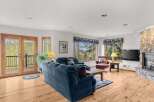 Step into this inviting living space, perfect for relaxation and entertaining.