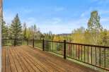 Enjoy breathtaking views from this stunning property! This home features a spacious deck, perfect for relaxing and entertaining.