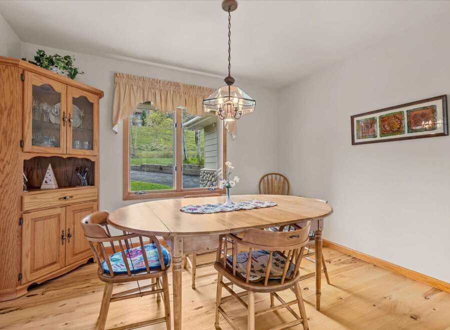 Step into this charming dining room, perfect for family gatherings and intimate meals.