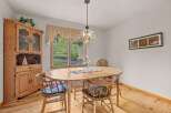 Step into this charming dining room, perfect for family gatherings and intimate meals.