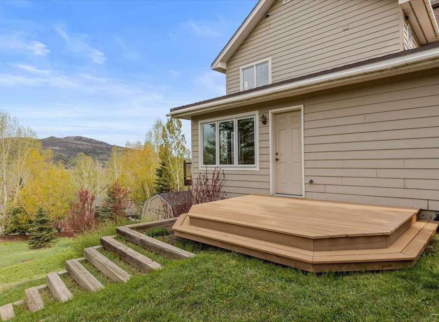 Discover the charm of this stunning property, featuring a beautifully crafted wooden deck perfect for outdoor relaxation and entertaining.