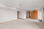 This spacious room features a neutral color palette, creating a versatile space for various design styles.