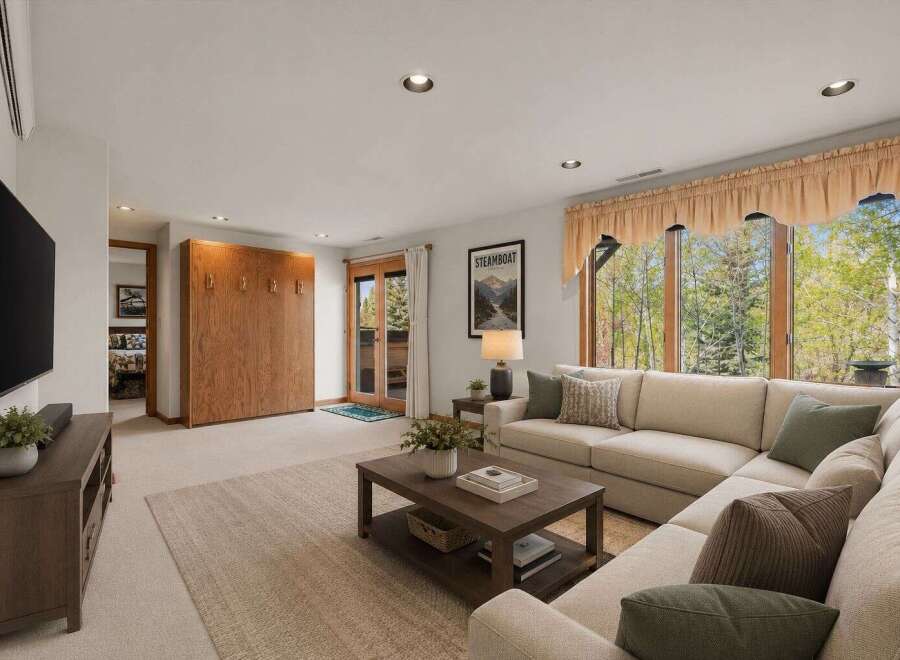 Step into this inviting living space, perfect for relaxation and entertaining.