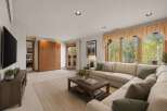 Step into this inviting living space, perfect for relaxation and entertaining.