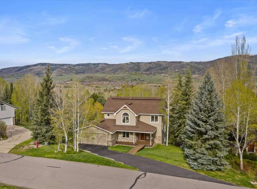 Nestled amidst the breathtaking mountain landscape, this stunning property offers a serene retreat.