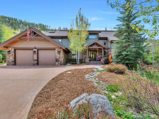 This stunning property boasts a beautiful exterior with a charming design.