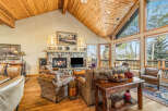 This stunning living room boasts a cozy fireplace, perfect for chilly evenings.
