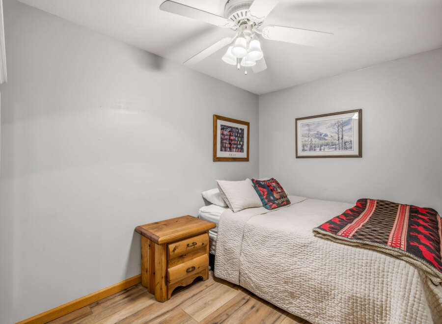 Cozy bedroom with a comfortable bed, perfect for relaxation.