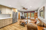 This stunning property boasts a warm and inviting living space, perfect for relaxation and entertaining.