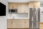 This stunning kitchen boasts modern appliances and ample storage space.