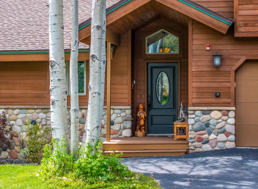 This stunning property boasts a charming exterior with a welcoming entrance.