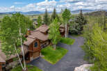 Nestled amidst lush greenery and breathtaking mountain views, this stunning property offers a serene escape.