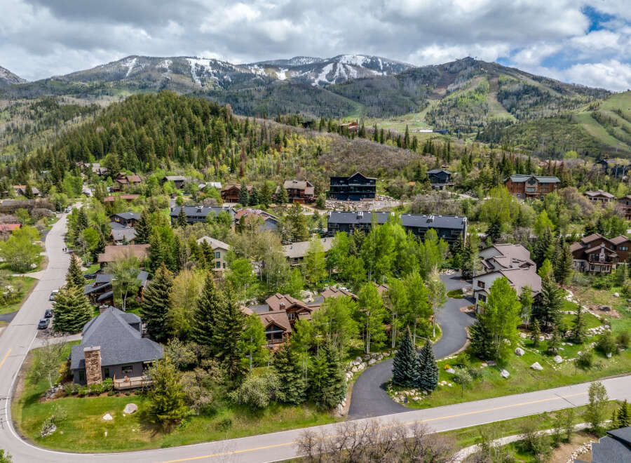 Nestled in a picturesque mountain setting, this stunning property offers a luxurious retreat.