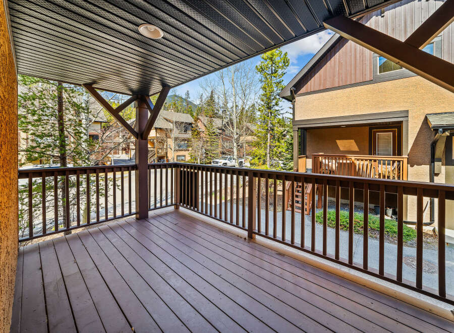 Enjoy the serene views from this charming balcony.