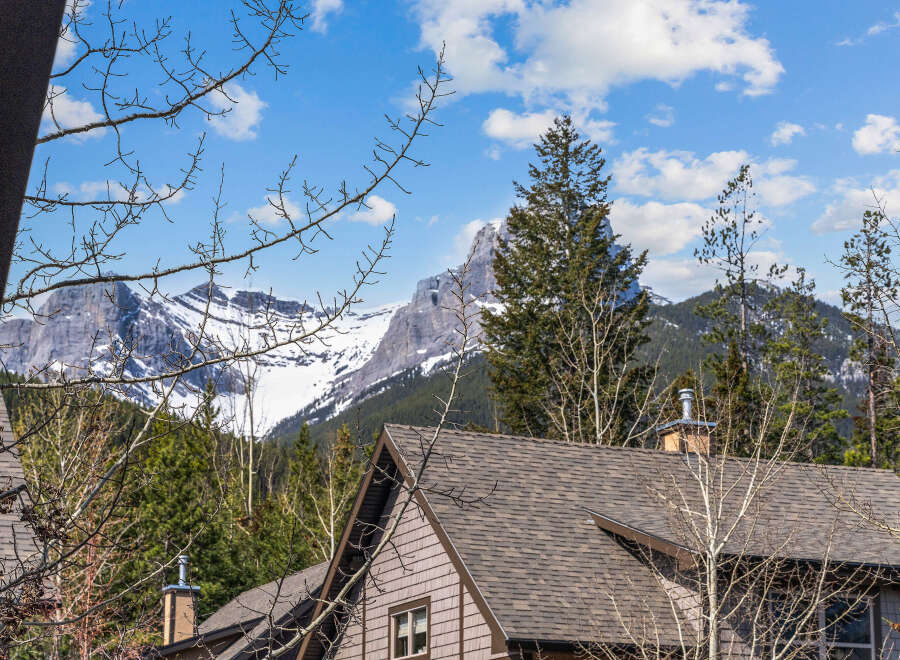 Nestled amidst the majestic mountains, this property offers stunning views and a serene atmosphere.