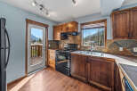 This stunning kitchen boasts a warm and inviting atmosphere, perfect for culinary creations and family gatherings.