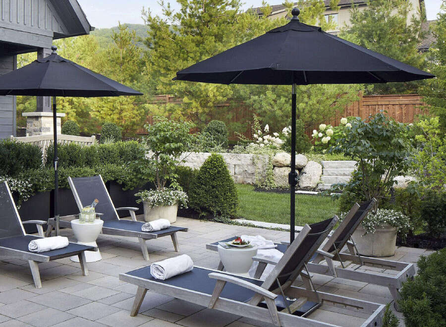 Enjoy luxurious outdoor living in this stunning property, featuring a beautifully designed patio area.