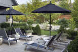 Enjoy luxurious outdoor living in this stunning property, featuring a beautifully designed patio area.
