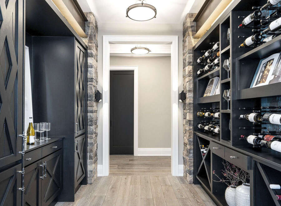 Step into luxury with this stunning wine cellar, a perfect addition to any home.