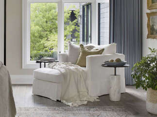 Experience luxury living in this stunning property, featuring a bright and airy living space.