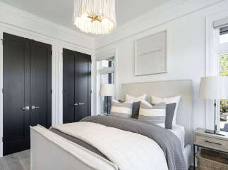 This stunning bedroom boasts a serene and inviting atmosphere, perfect for relaxation.