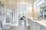 Step into luxury with this stunning bathroom, featuring a sleek design and modern amenities.