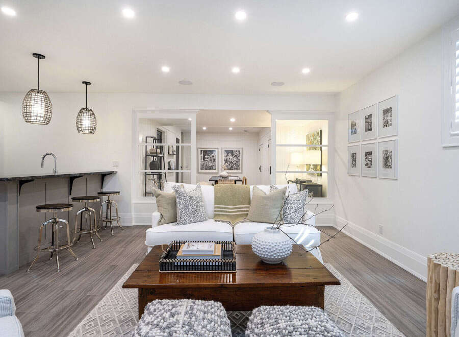 This stunning living space boasts a modern design with a touch of elegance.