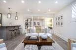 This stunning living space boasts a modern design with a touch of elegance.