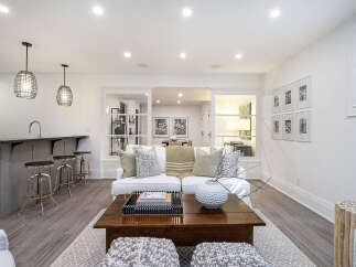 This stunning living space boasts a modern design with a touch of elegance.