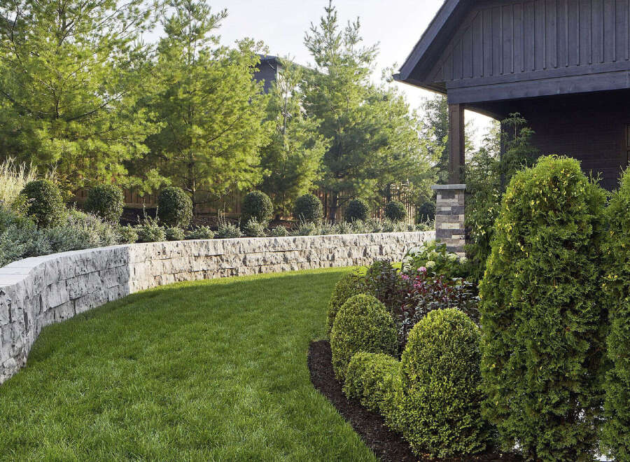 This stunning property boasts a beautifully landscaped yard, perfect for outdoor enjoyment.