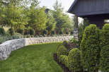 This stunning property boasts a beautifully landscaped yard, perfect for outdoor enjoyment.