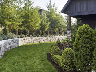 This stunning property boasts a beautifully landscaped yard, perfect for outdoor enjoyment.