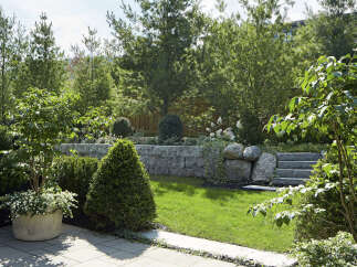 Discover the tranquility of this beautifully landscaped property, perfect for those seeking a serene outdoor space.