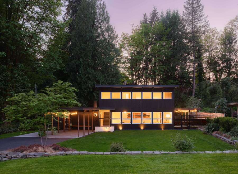 This stunning modern home offers a perfect blend of style and tranquility.