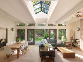 This stunning property boasts a bright and airy open-concept living space, perfect for modern living.