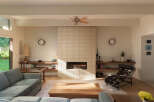 This stunning living room boasts a modern design with a cozy fireplace, perfect for relaxing evenings.
