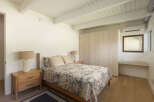 This stunning bedroom boasts a modern design with a touch of elegance.