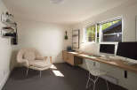 This modern home office offers a bright and airy workspace, perfect for productivity.