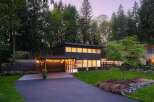 This stunning modern home offers a perfect blend of contemporary design and natural beauty.
