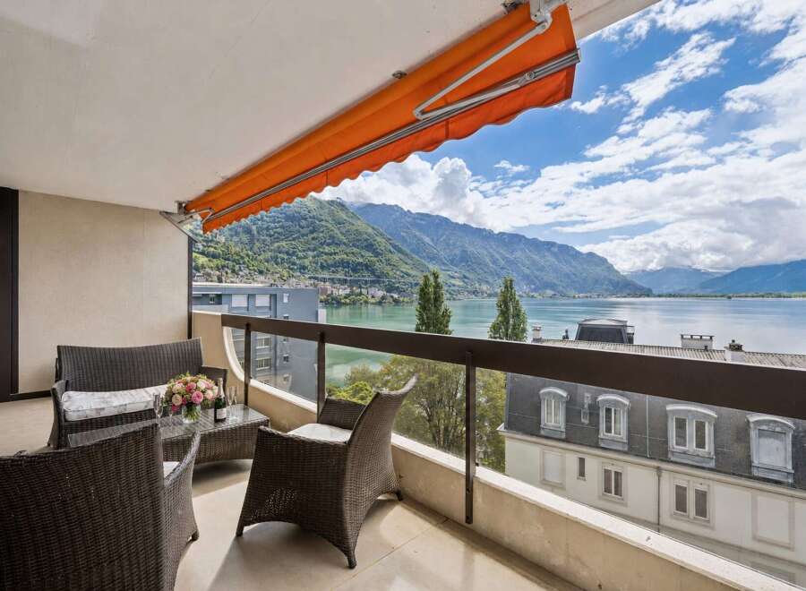 Enjoy breathtaking lake and mountain views from this stunning balcony, perfect for relaxing or entertaining.