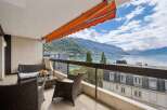Enjoy breathtaking lake and mountain views from this stunning balcony, perfect for relaxing or entertaining.