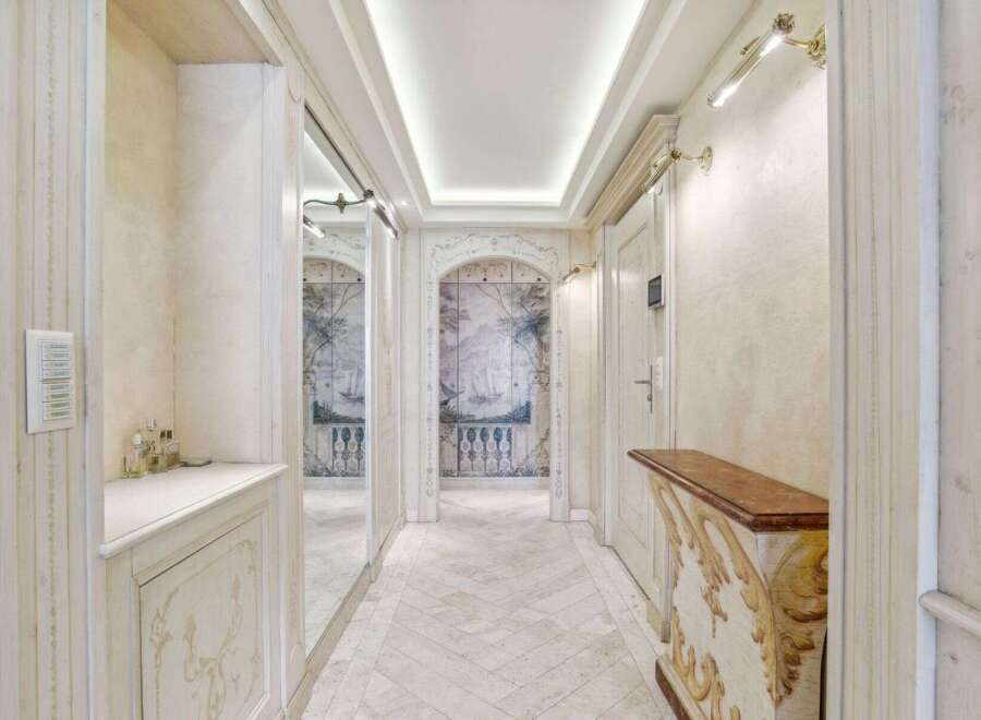 Step into luxury with this stunning hallway, showcasing exquisite architectural details and elegant design.