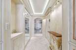 Step into luxury with this stunning hallway, showcasing exquisite architectural details and elegant design.