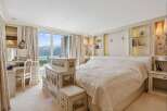 Experience luxury living in this exquisite bedroom, boasting stunning views and elegant design.