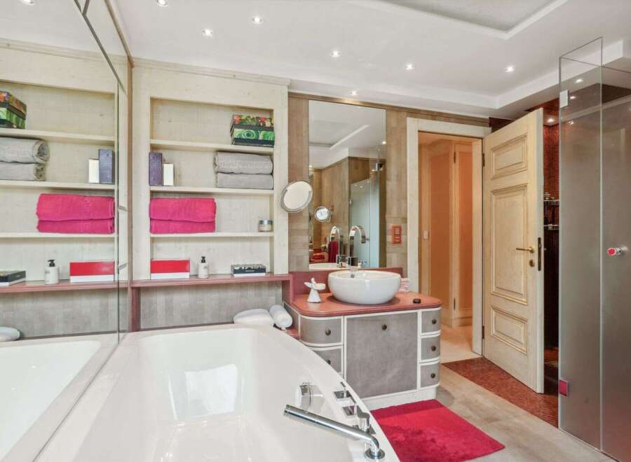 Indulge in luxury within this stunning bathroom, featuring a sleek, modern design.