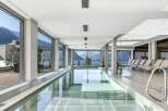 Experience luxury living with this stunning indoor pool, offering breathtaking mountain and lake views.