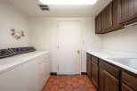 This laundry room features a classic design with a focus on functionality.