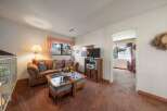 Step into this inviting living space, perfect for relaxation and entertaining.
