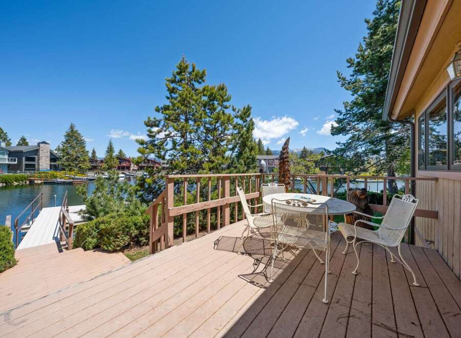 Enjoy breathtaking lake views from this stunning property! This home features a spacious deck perfect for entertaining or relaxing.